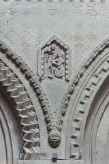 Stone detailing in the nave: nose picker with monkey