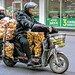 A scooter fully loaded with ginger.