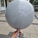 2019 Anagram 15-Inch Metallic White Orbz Round Foil Mylar Balloon (Late 2021 Ver.) Inflated with Helium (Taken at Outside)