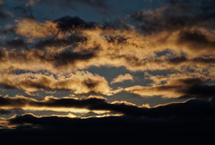 Rising sun through clouds - Photo of Handschuheim