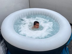 Child enjoying water, France