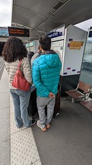 Queue for single ticket machine at Paris Orly Airport tram stop, Paris, France - Photo of Champlan