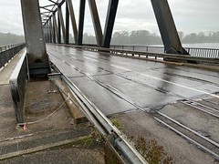 Start of the bridge - note tracks in the asphalt
