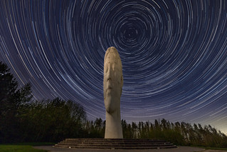 The diurnal circles of a star trail behind the Dream sculpture in St Helens. The sculpture is by an artist named Jaume Plensa and was erected in 2009