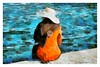 Girl in an Orange Coat, Torquay Harbour, 2020 - Photo Impressionism & Art