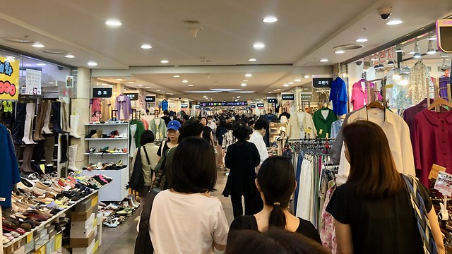 Shopping in the Seoul Express Bus Terminal.  Stores as far as the eye can see.