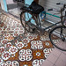 Which one's older, the floor tiles or the bicycle?