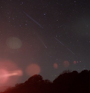 Comet Atlas A3, Starlink and lens flare.