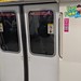 Lights indicating which side of the train doors will open on a East-West Line MRT train, Singapore